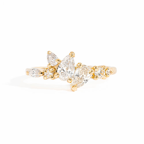 Seven Stone Diamond Ring with Two Pear Cut Diamonds in 18 Carat Yellow Gold