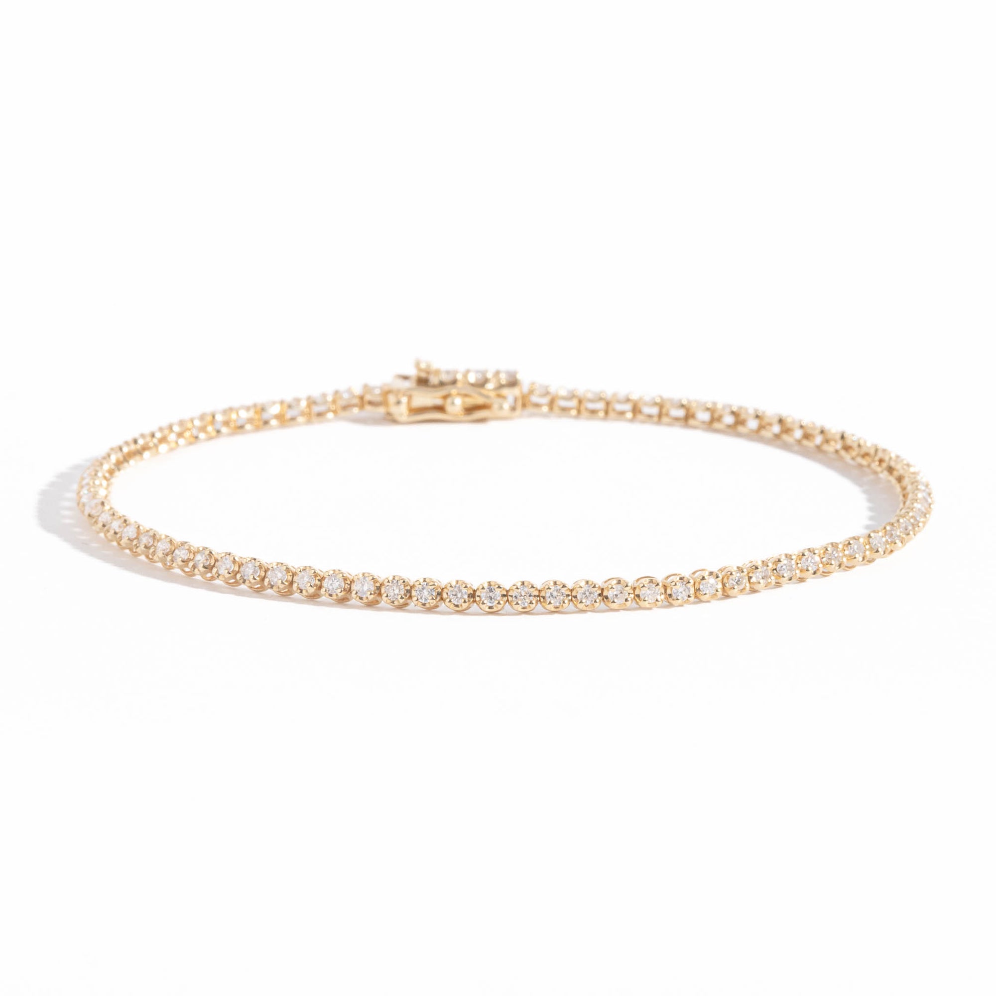 White Diamond Tennis Bracelet in 14 carat yellow gold