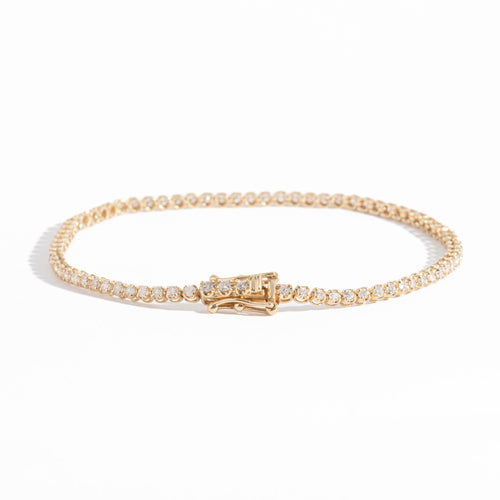 White Diamond Tennis Bracelet in 14 carat yellow gold