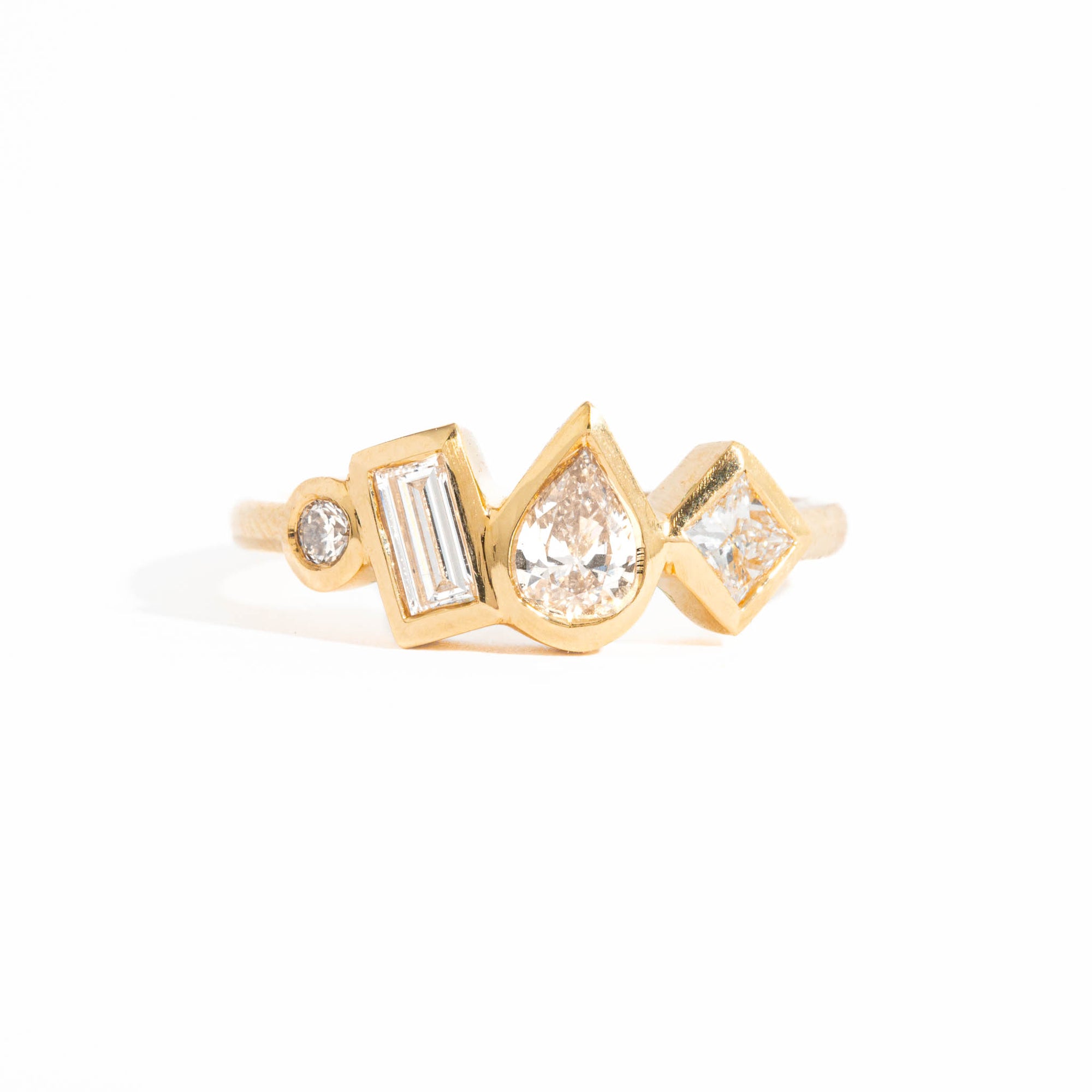 Four Stone Pear Cut, Baguette Cut and Princess Cut Bezel Set Diamond Engagement Ring in 18 Carat Yellow Gold 