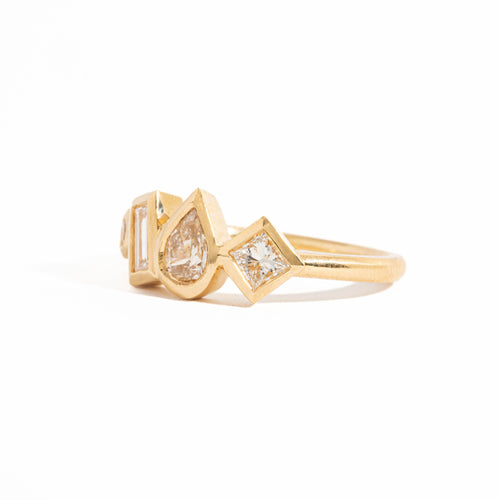 Four Stone Pear Cut, Baguette Cut and Princess Cut Bezel Set Diamond Engagement Ring in 18 Carat Yellow Gold 