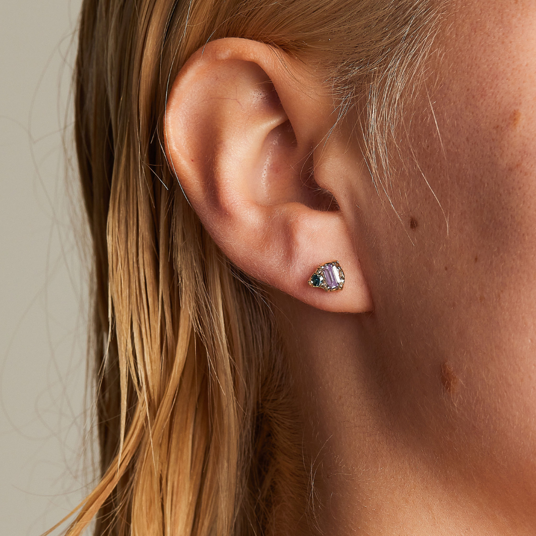 Two stone earrings with emerald cut pink sapphires and ethically sourced blue Australian sapphires crafted in 9ct yellow gold by Black Finch Jewelley