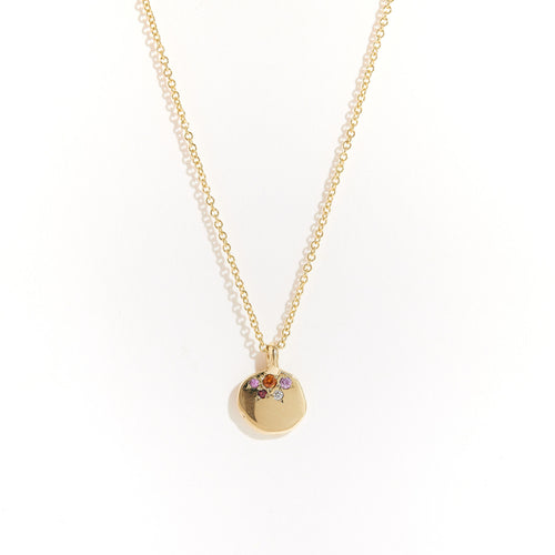 Handcrafted in Melbourne a 9ct yellow recycled, refined gold pendant with diamonds and sapphires.