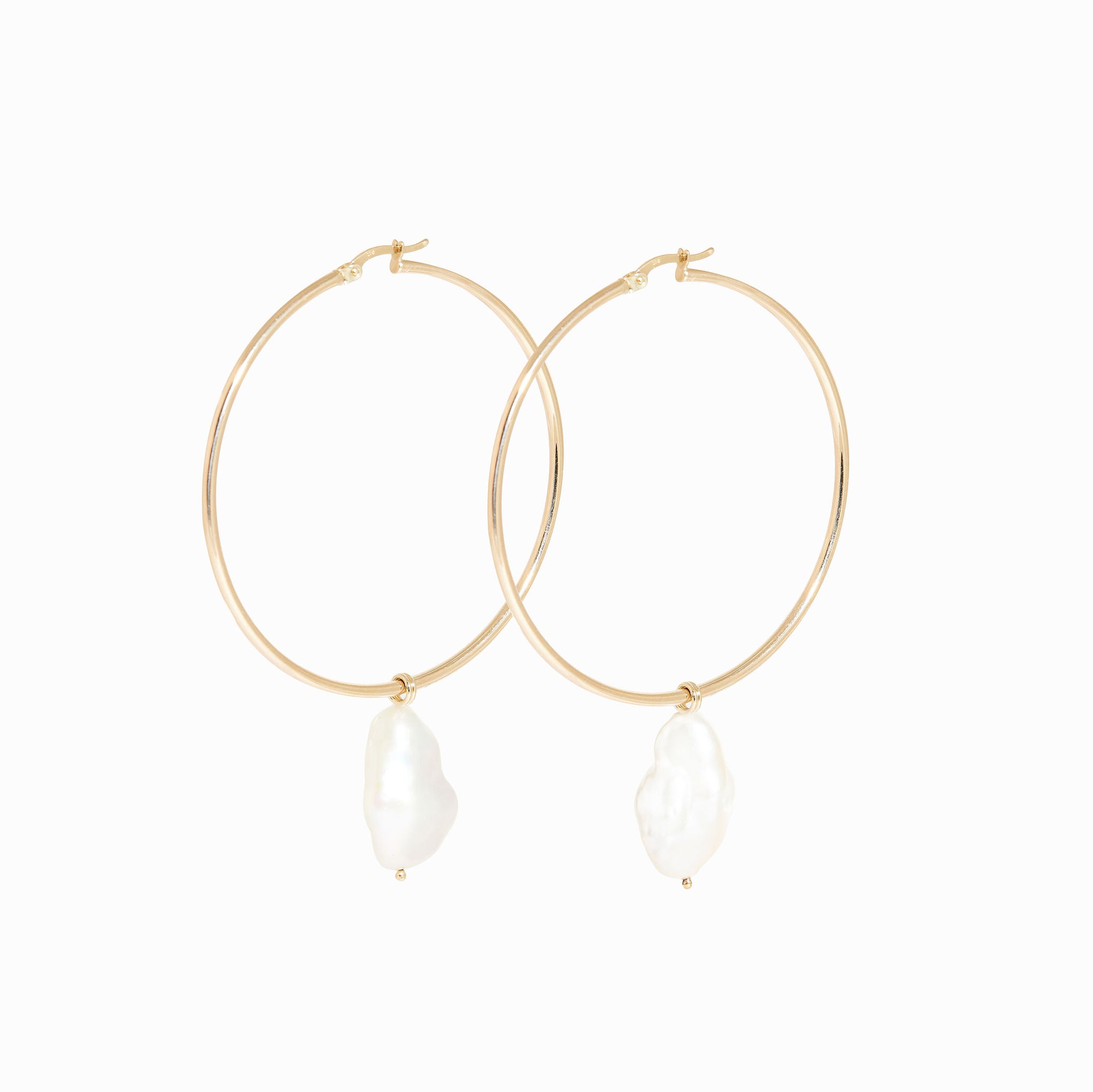 Large pearl statement hoop earrings. Bespoke handmade jewellery made in Melbourne.