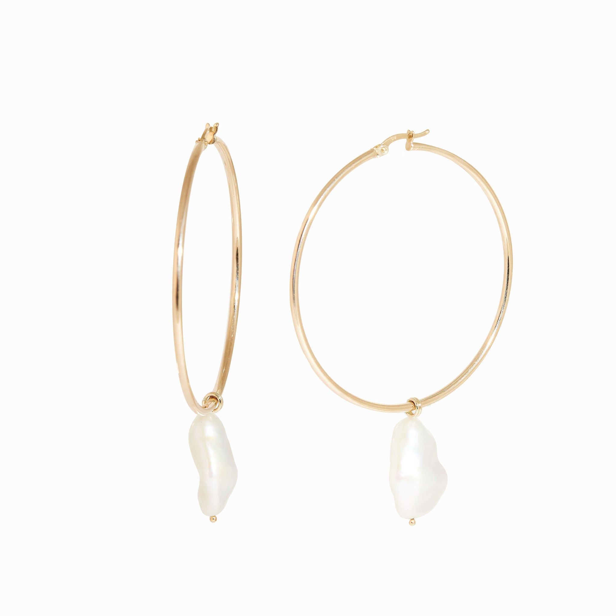 Large pearl statement hoop earrings. Bespoke handmade jewellery made in Melbourne.