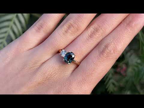 Video of Handmade, bespoke Australian sapphire two stone engagement cluster ring, set with ethically sourced Australian sapphire and champagne diamond, set in 18ct recycled, refined yellow gold.