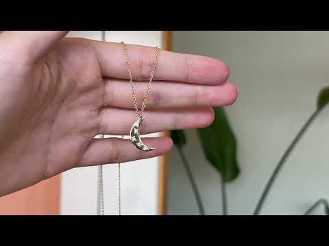 Made in Melbourne crescent moon pendant in 9ct yellow gold with diamonds star set. 