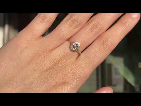 9ct yellow gold signet ring with star set pink sapphire in centre. Bespoke and handmade in Melbourne by Black Finch Jewellery Shown on model