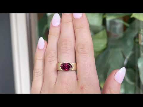 Garnet ring wth 7mm band and partial bezel setting